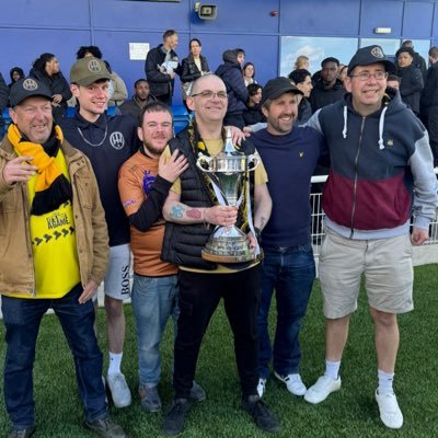 Member of the Essex Wickers cheering Hackney Wick fc on to victory.