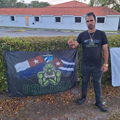 Miembro de Exilio Unido Ya y creador del movimiento opositor ORCOMA, rapero contestatario a la dictadura terrorista y asesina de Cuba y republicano MAGA 100%