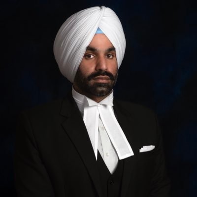 Indian. Lawyer, Liverpool fanatic and tattoo collector.