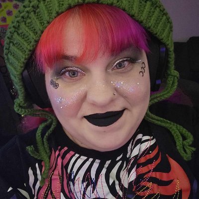 Michi (She/Her) an author, mom and twitch streamer.