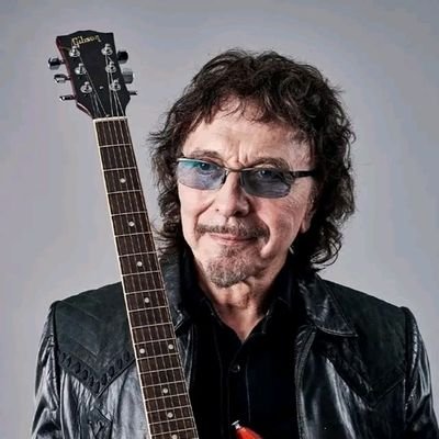 Tony Iommi Black Sabbath's riff master.Pioneering heavy metal guitarist.🎸Creator of iconic sounds that shaped a genre.Still rocking, still riffing