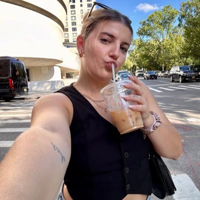 probably drinking an iced coffee and talking about Taylor Swift 🍉