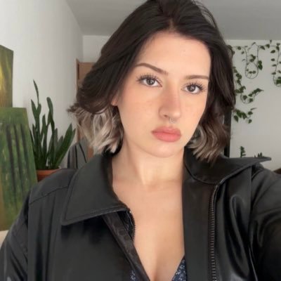 NoaJung1's profile picture. The boobs are real, the smile is fake