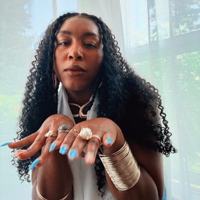 The Star. Midwife of creativity. Rapper, Singer, Artist, Reiki Practitioner, Doula extraordinaire.