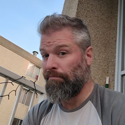 AdamMcGale's profile picture. Man/beard.