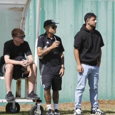 Just a guy from Athens, working as a football coach.