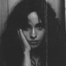 Camila_Cabello's profile picture. long, thick black hair turned white from flying too close to the sun.