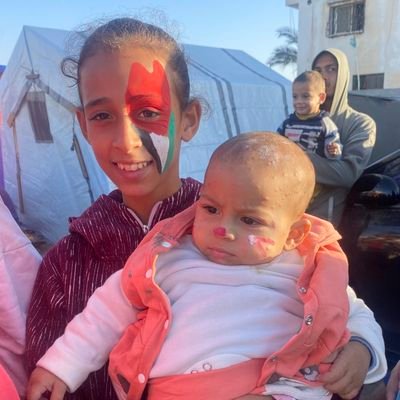 I am a mother of 6 children. The occupation forces arrested my husband. I live in my father's tent. I share with you my daily life with my brother