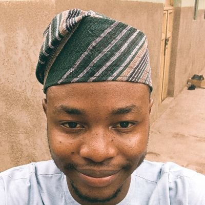 A happy Manchester United Fan.
Nigerian Chess Player.