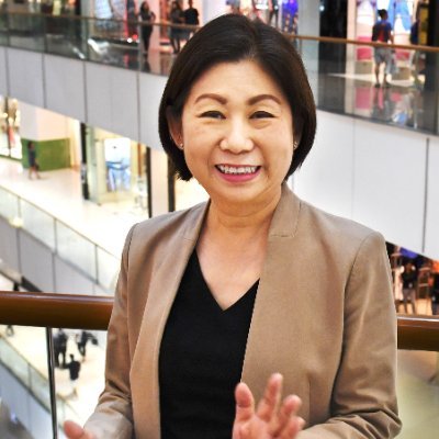 A wife, mother or two, I'm a Banker In UOB Bank of Thailand. A very smart woman, Respected by everyone.