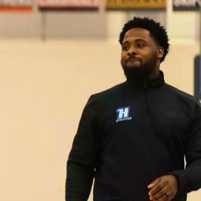 COACH E Profile