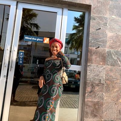 A very happy girl that believes GOD gat her at every step in life