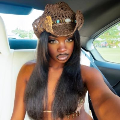 dark skinned Christian Dior poster girl