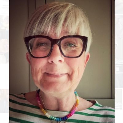 Member of the DDC. Has daughters. Drives a Mini. Owns too many dogs. Likes cake and a stripey top.