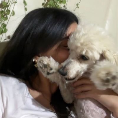 Woman in black lace and boots beside a wolf-like dog💦🥰🐾🐶