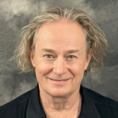 Donny Osborn is a singer/songwriter, keynote concert presenter, and author of Building Your Dreams: A Step-By-Step Method.
