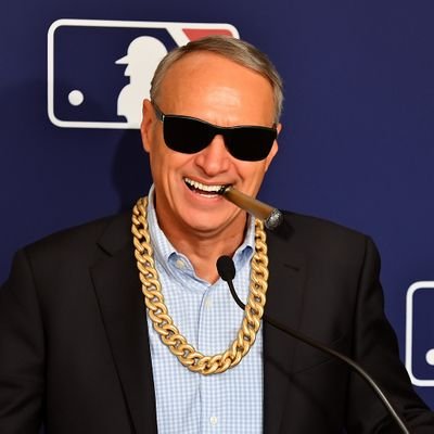 Commissioner of Baseball (allegedly). Lover of pitch clocks, ghost runners, and totally normal uniforms. Booed in 30 ballparks and counting. Parody.