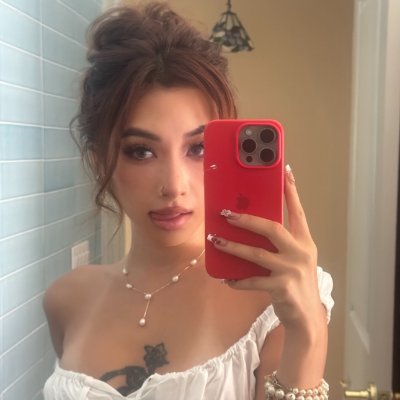 A female entrepreneur from New York who runs a chain of eyelash and nail salons and a clothing design business. Her personal interests include traveling and fit