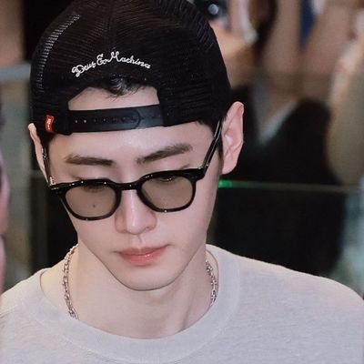 Sunghoon – Grace of Apollo, poised like an eternal sculpture, where beauty meets divine rhythm.