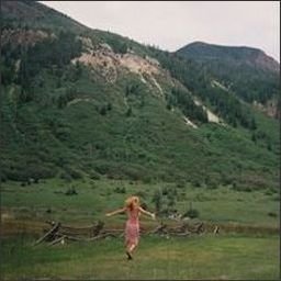 She dances to the songs in her head, speaks with the rhythm of her heart.