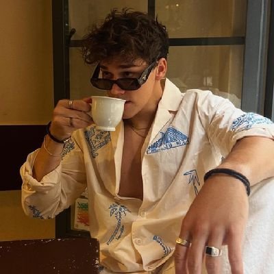 Texan with coffee, music, and news updates.