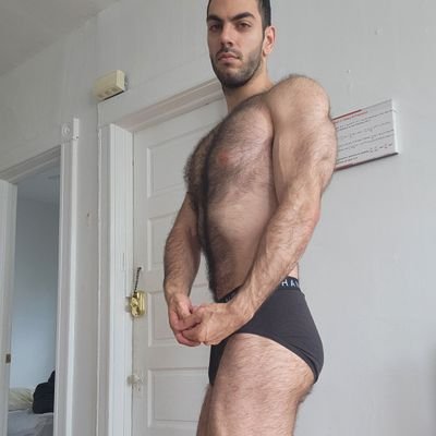 Gay Palestinian and Armenian natural bodybuilder; former competitive powerlifter