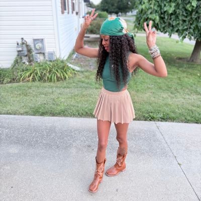 divinebeauti03's profile picture. 💙🏁