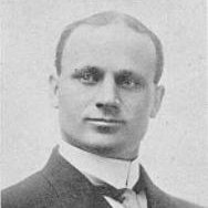 The ghost of Harvey Holmes. A broad-shouldered fellow in leather helmet and woolen jersey, cleats clattering like horse hooves across a muddy gridiron. Go Utes!
