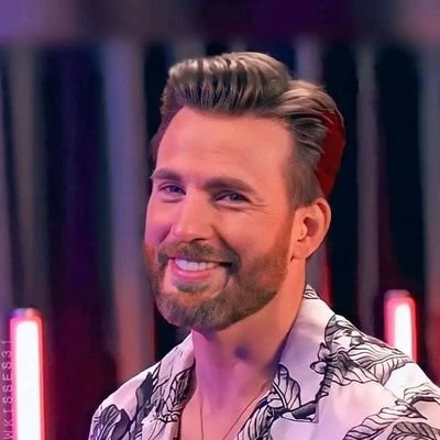 Host of the virgin radio breakfast show sky, creator of car Fest, custodian 500 But mostly punching way above his weight the marriage dept.