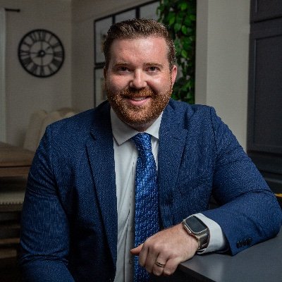 Former U.S. Secret Service agent - Workers Rights Attorney - Son of Western Kentucky - Husband - Father - Candidate for U.S. Senate.