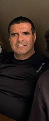 Ex jugador de americano, coache durante 40 años en los Perros Negros,aficionado a los deportes y parlanchin