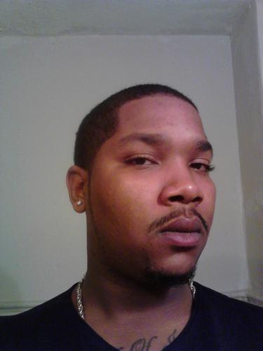 Blunt blowing , polo boxers showing , i dont give a lovely motha fuck ass nigga