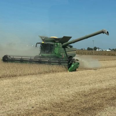 I drive tractors and check on farmers