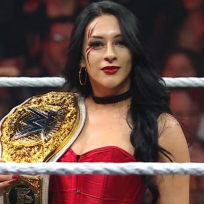 Known as The Dark Angel, putting fear into the hearts of her opponents by sealing their fate with a devil's kiss and beautiful destruction. | parody, not real.