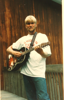 Former guitar god (demigod?), rebuilding calluses...
Lifelong songwriter/singer.
Unk status.
Happily married.