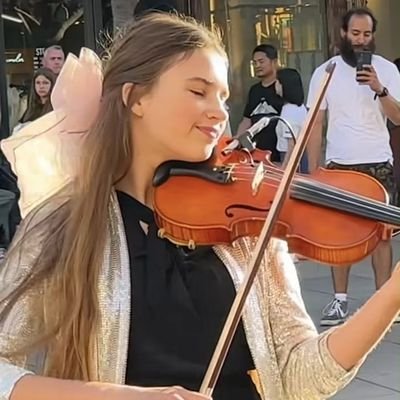 karolinaprotsko's profile picture. I love playing my violin