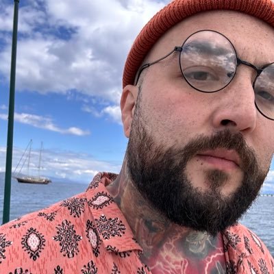 GrogSwillinDill's profile picture. Senior Designer working @RareLTD on @SeaofThieves. | Dogs | Pop-punk | Tattoos I WoW