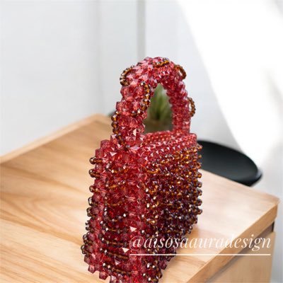 _Neiomie's profile picture. Hi, I’m Atinuke, creative soul with a love for art, beads, and meaningful design. Through Aisosa Aura Design, I handcraft bags that carry both beauty and story