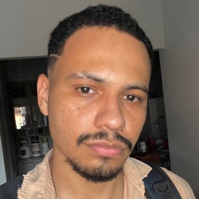 JimRique's profile picture. It's dark but just a GAY 🏳‍🌈