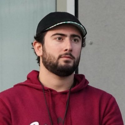 EliSlovin's profile picture. 𝙳𝚒𝚛𝚎𝚌𝚝𝚘𝚛 𝚘𝚏 𝚅𝚒𝚋𝚎𝚜. Alright, here’s the deal, all takes are mine, except for bad ones.𝐔𝐌𝐚𝐬𝐬 Alum. Boston Sports & Music Lover. Here to LAUGH.