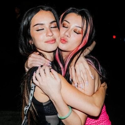 meiziniloops's profile picture. for #KATSEYE's daniela and megan. 🦁🦊