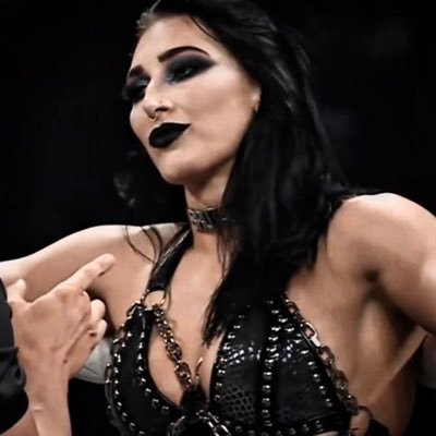 ripleycvlt's profile picture. rhea ripley and bts extremist