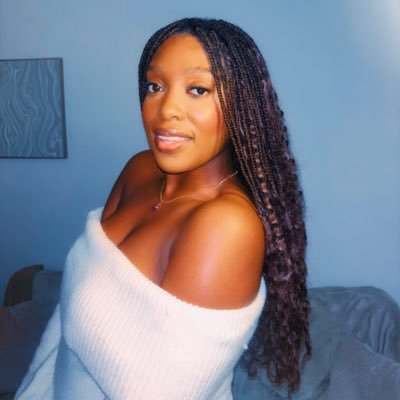 _SimbyDeborah's profile picture. She is clothed with strength and dignity. 🎗