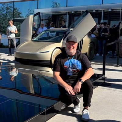 ChrisandJulie's profile picture. in our Tesla era