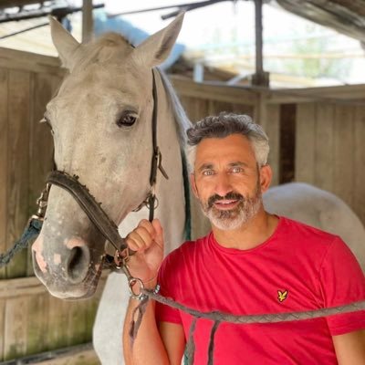 GiraffeFuzzies's profile picture. There is something about the outside of a horse that is good for the inside of a man.🏇