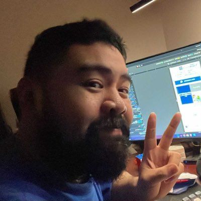 ejlmariano's profile picture. In front of refrigerator.