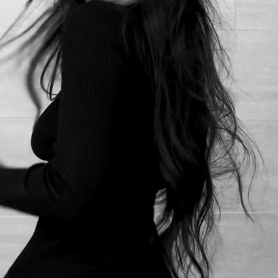 lovelustfatale's profile picture. the queen of wands and her little black cat.