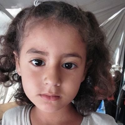 ElmasriSeman's profile picture. I am Iman, from the heart of Gaza, a land burdened with suffering. A mother of three, eight months pregnant, I face with my children days that feel like a fleet