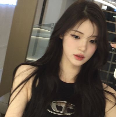 yuharame's profile picture. Pink blush with a ribbon