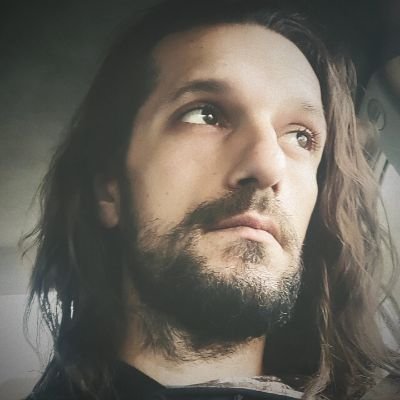 Slizzard316's profile picture. Just a Dad. Under a pale, gray sky.